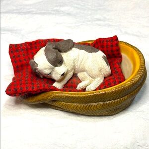 Charming Canine Figurine with Red Cushion